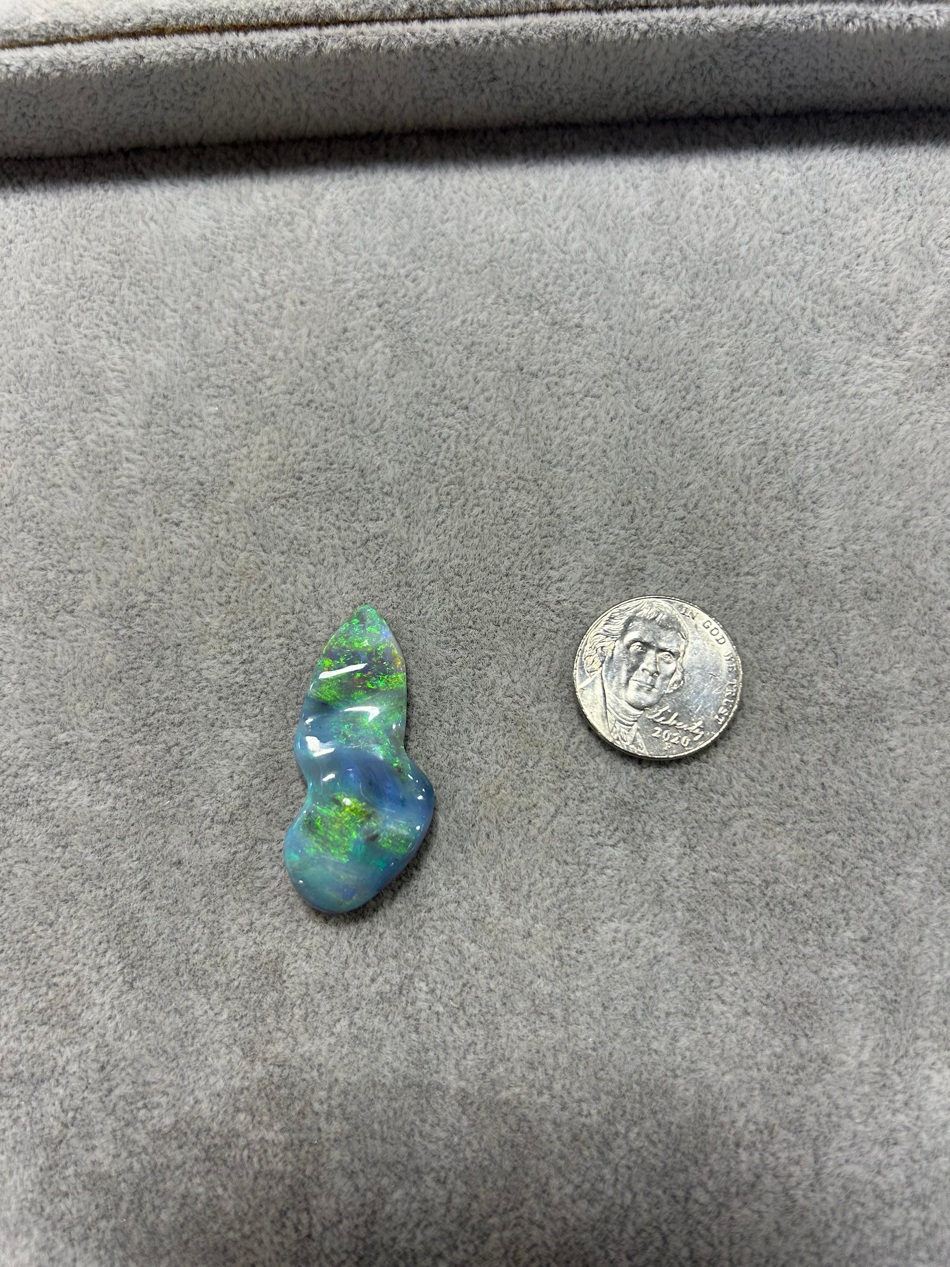 Black Opal with green and blue waves