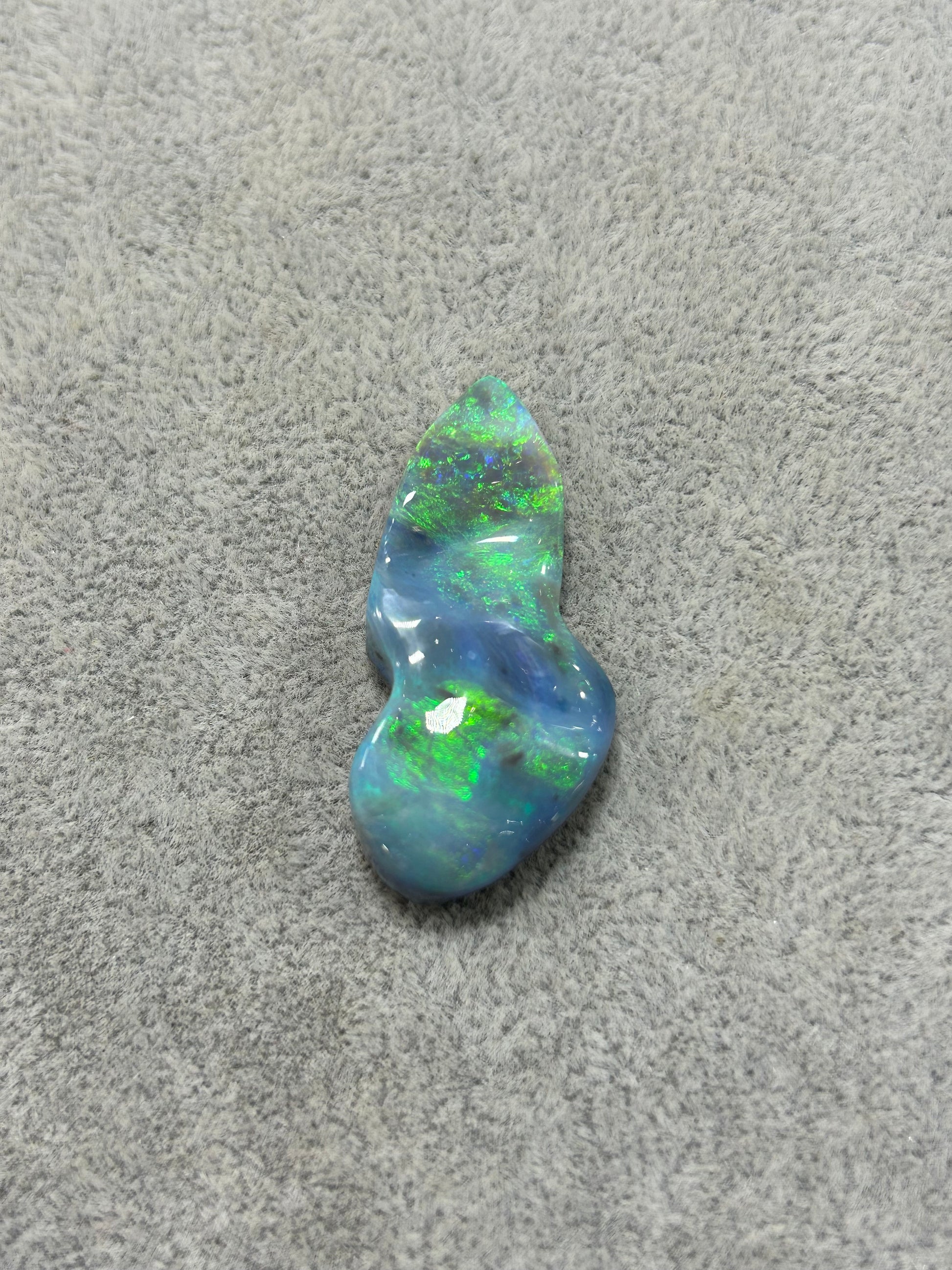 Black Opal with green and blue waves