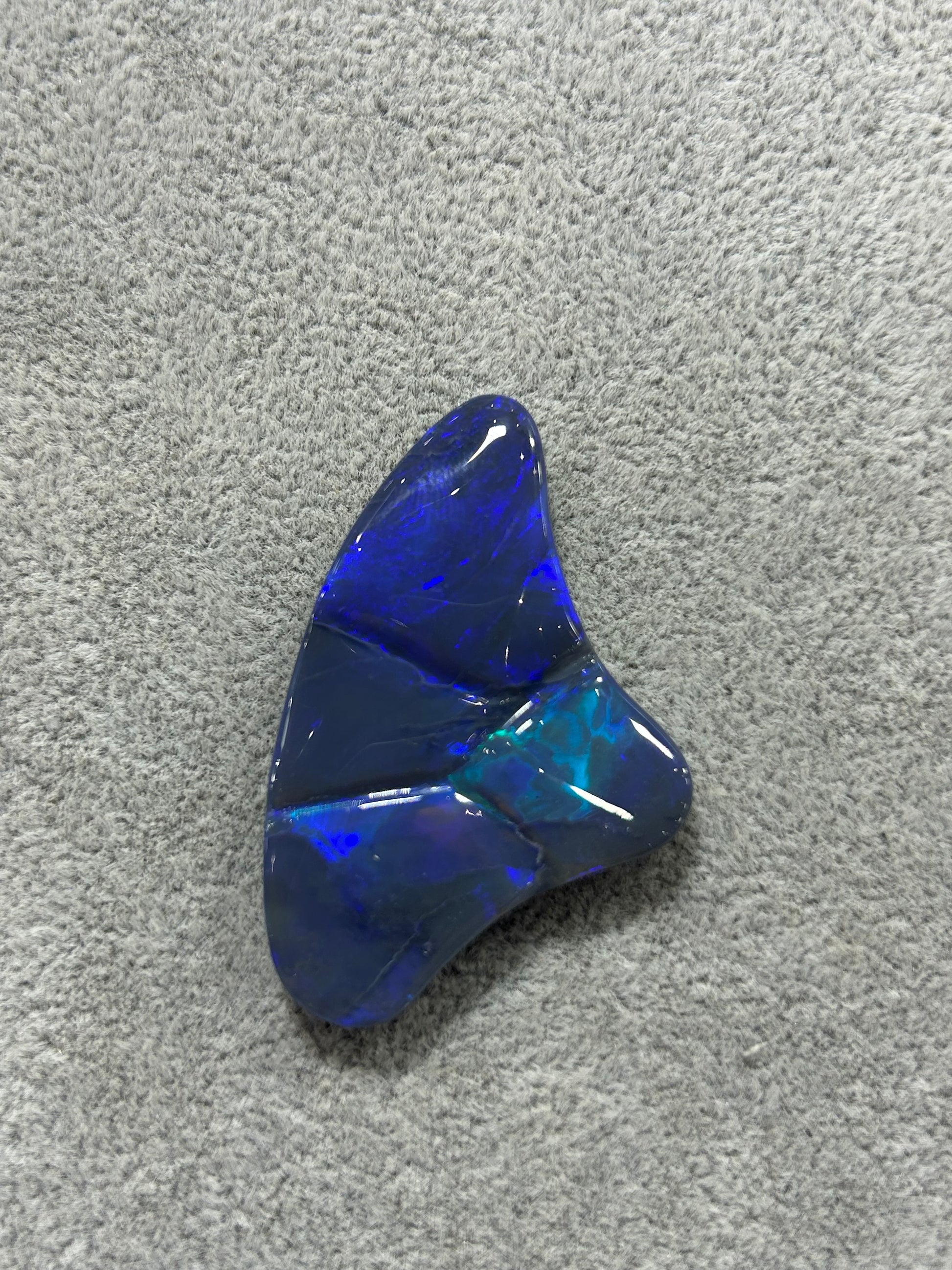 Carved Shark fin shaped Blue opal